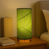 Eangee green cocoa leaf cylinder table lamp, 12-inch height with a natural leaf design, perfect for ambient lighting.