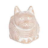 Ceramic cat-shaped object with a decorative design on a white background