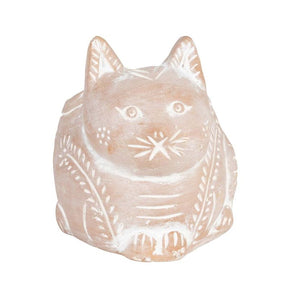 Ceramic cat-shaped object with a decorative design on a white background