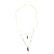 Faire Collection Allie Necklace with a smooth, cool gray pendant on a delicate chain, modern jewelry accessory for stylish looks.
