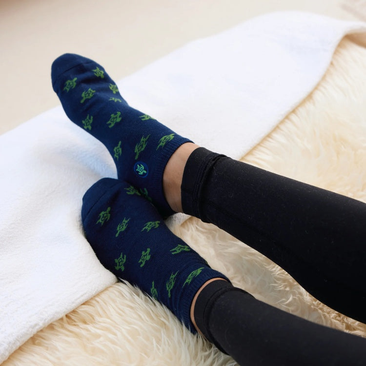 Navy ankle socks by Conscious Step featuring turtle protection design, made for comfort and eco-friendly fashion.