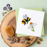 Colorful Bumble Bee Quilling Card by Quilling Card featuring intricate paper quilling art of a bee on a decorative background.