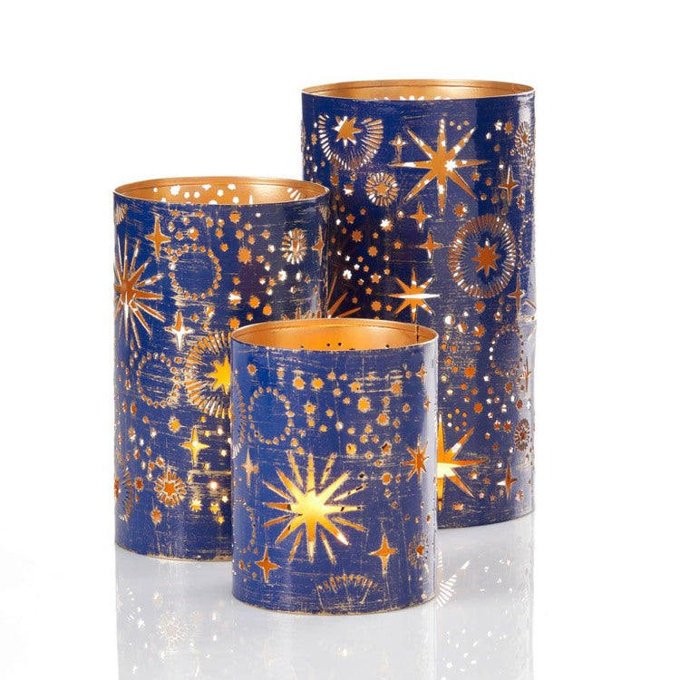Set of three Serrv celestial lanterns with intricate star and moon designs, ideal for outdoor or indoor decorative lighting.