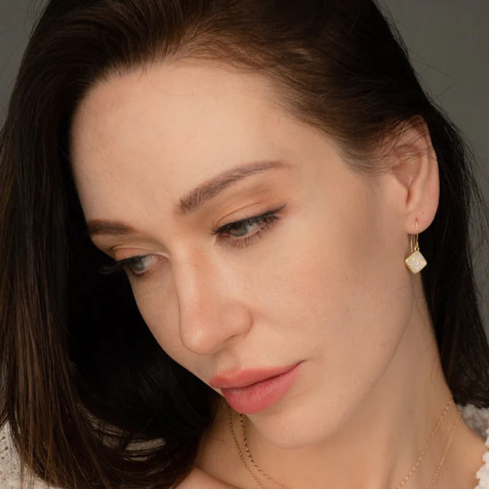 clare opal earrings model