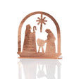 Copper tea light holder featuring a detailed nativity scene, crafted by Serrv, perfect for gentle holiday or spiritual ambiance.