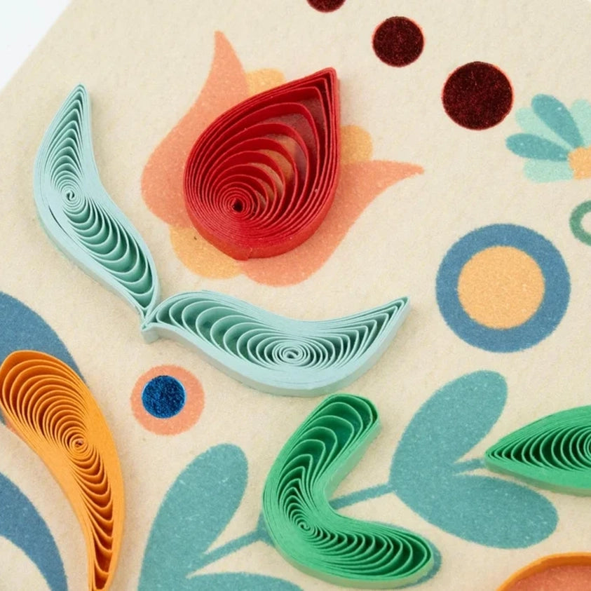Close-up of a colorful folk art quilling card by Quilling Card with intricate paper quilling details.