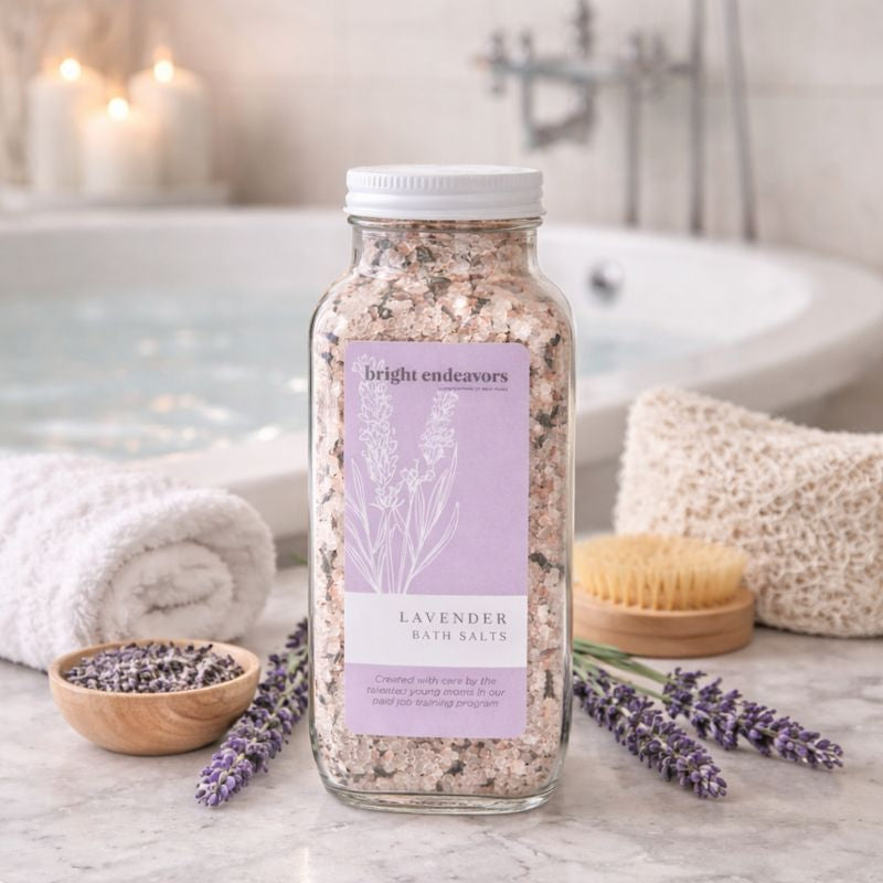 Bright Endeavors lavender bath salts in a 16 oz jar with lavender flowers and salts, perfect for relaxing bath routines.