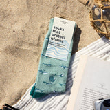Conscious Step whale protection socks featuring marine life design, eco-friendly cotton, and comfortable fit for sustainable fashion.