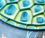 Decorative sea turtle quilling card featuring intricate paper quilling art, perfect for greeting or special occasions.