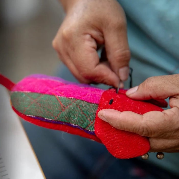 artisan crafting dog skillet handle in Guatemala 
