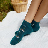 Teal ankle socks by Conscious Step featuring playful hedgehog designs that support pollinator protection.