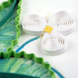 Close-up of a Quilling Card featuring wild strawberries with detailed paper quilling and leaf designs.